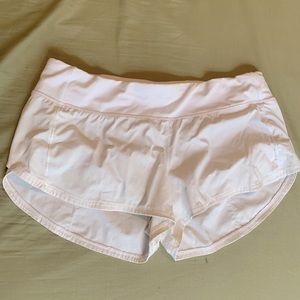 White Lululemon running shorts